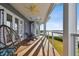 Large deck with spiral stairs and water views at 5531 2Nd Avenue W Cir, Palmetto, FL 34221
