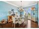 Bright dining room with hardwood floors and access to a patio at 5531 2Nd Avenue W Cir, Palmetto, FL 34221