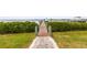 Private dock with walkway leading to the water at 5531 2Nd Avenue W Cir, Palmetto, FL 34221