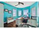 Spacious home office with a large desk and stunning water views at 5531 2Nd Avenue W Cir, Palmetto, FL 34221