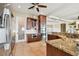 Bright kitchen with island, double oven, and granite countertops at 5531 2Nd Avenue W Cir, Palmetto, FL 34221