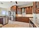 Modern kitchen with ample cabinetry, granite counters & stainless steel appliances at 5531 2Nd Avenue W Cir, Palmetto, FL 34221