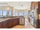 Kitchen boasts granite counters, stainless steel appliances, and water views at 5531 2Nd Avenue W Cir, Palmetto, FL 34221