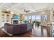 Living room with hardwood floors, sectional sofa, and water views at 5531 2Nd Avenue W Cir, Palmetto, FL 34221