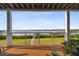 Stunning view of the water from a deck with walkway to the dock at 5531 2Nd Avenue W Cir, Palmetto, FL 34221