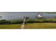 Private dock with boat lifts, offering stunning water views and direct water access at 5531 2Nd Avenue W Cir, Palmetto, FL 34221