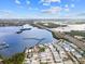Aerial view of waterfront community with boat docks and homes at 6 Seminole Dr, Bradenton, FL 34208
