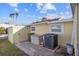 Backyard with storage shed, AC unit and space for bins at 6 Seminole Dr, Bradenton, FL 34208