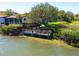 A beautiful dock and deck perfect for fishing or relaxing on the water at 6283 Midnight Pass Rd # 6283, Sarasota, FL 34242