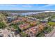Aerial view showing a collection of upscale townhouses near the water at 6418 Margarita Shores Ln, Apollo Beach, FL 33572