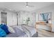 Spacious bedroom with a king-size bed and large windows at 6418 Margarita Shores Ln, Apollo Beach, FL 33572