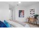 Bedroom with a queen-size bed and a workspace at 6418 Margarita Shores Ln, Apollo Beach, FL 33572