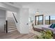 Bedroom with a king-size bed and access to a balcony at 6418 Margarita Shores Ln, Apollo Beach, FL 33572