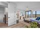 Spacious bedroom with a balcony, and lots of natural light at 6418 Margarita Shores Ln, Apollo Beach, FL 33572