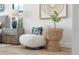 Cozy sitting area with a comfy chair and stylish side table at 6418 Margarita Shores Ln, Apollo Beach, FL 33572