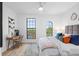 Main bedroom with a king-size bed and city views at 6418 Margarita Shores Ln, Apollo Beach, FL 33572