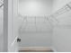 Walk-in closet with wire shelving for ample storage at 6418 Margarita Shores Ln, Apollo Beach, FL 33572