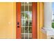 Modern front door with keyless entry and glass panels at 6418 Margarita Shores Ln, Apollo Beach, FL 33572