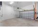 Spacious garage with overhead door and ample storage space at 6418 Margarita Shores Ln, Apollo Beach, FL 33572