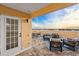 Private rooftop patio with seating and city views at 6418 Margarita Shores Ln, Apollo Beach, FL 33572