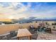 Spacious rooftop patio with dining and lounge areas at 6418 Margarita Shores Ln, Apollo Beach, FL 33572