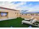 Enjoy amazing city views from this rooftop terrace, complete with artificial turf and lounge seating at 6418 Margarita Shores Ln, Apollo Beach, FL 33572