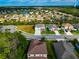 Aerial view of a house and surrounding neighborhood at 7404 Mill Hopper Ct, Palmetto, FL 34221