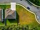 Aerial view of a single Gathering home with well-maintained landscaping and driveway on a cul-de-sac at 7404 Mill Hopper Ct, Palmetto, FL 34221