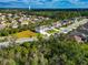 Aerial view showing a residential lot surrounded by homes at 7404 Mill Hopper Ct, Palmetto, FL 34221