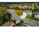 Aerial view of a house next to a vacant lot at 7404 Mill Hopper Ct, Palmetto, FL 34221