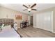 Bedroom with a twin bed, closet, and ceiling fan at 7404 Mill Hopper Ct, Palmetto, FL 34221