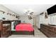 Bedroom featuring a ceiling fan, closet, and laminate floor at 7404 Mill Hopper Ct, Palmetto, FL 34221