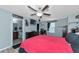 Main bedroom with a large bed and en-suite bathroom at 7404 Mill Hopper Ct, Palmetto, FL 34221