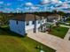 Two-story house with a two-car garage and landscaped yard at 7404 Mill Hopper Ct, Palmetto, FL 34221