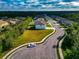 Residential street featuring single-Gathering homes and landscaped yards in a suburban community with mature trees at 7404 Mill Hopper Ct, Palmetto, FL 34221