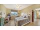 Bright bedroom with lake view and private access at 7616 Alumni Trl, Sarasota, FL 34243