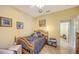 Bedroom with a bed and built-in closet at 7616 Alumni Trl, Sarasota, FL 34243