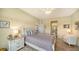 Charming bedroom with ensuite bathroom access at 7616 Alumni Trl, Sarasota, FL 34243