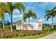 University Village entrance sign, welcoming residents to this beautiful community at 7616 Alumni Trl, Sarasota, FL 34243
