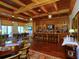 Elegant clubhouse bar with wood finishes and comfortable seating at 8325 Lindrick Ln, Bradenton, FL 34202