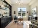 Bright home office features built-in shelving and large window at 8325 Lindrick Ln, Bradenton, FL 34202