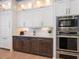Kitchen with white cabinets, stainless steel appliances, and quartz countertops at 8325 Lindrick Ln, Bradenton, FL 34202