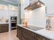 Modern kitchen features stainless steel appliances and white shaker cabinets at 8325 Lindrick Ln, Bradenton, FL 34202