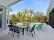 Inviting pool area with seating and tranquil outdoor setting at 8325 Lindrick Ln, Bradenton, FL 34202