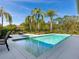 Resort-style pool with spacious patio and privacy fence at 8325 Lindrick Ln, Bradenton, FL 34202