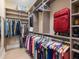 Large walk-in closet with ample shelving and hanging space at 8325 Lindrick Ln, Bradenton, FL 34202