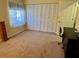 Bright bedroom featuring a large closet and window with natural light at 1111 Faith W Cir # 2003, Bradenton, FL 34212