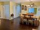 Dining area with wooden table and chairs at 1111 Faith W Cir # 2003, Bradenton, FL 34212