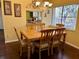 Bright dining room with wooden table and chairs at 1111 Faith W Cir # 2003, Bradenton, FL 34212