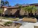 Condo building with stairs, landscaping, and walkway at 1111 Faith W Cir # 2003, Bradenton, FL 34212